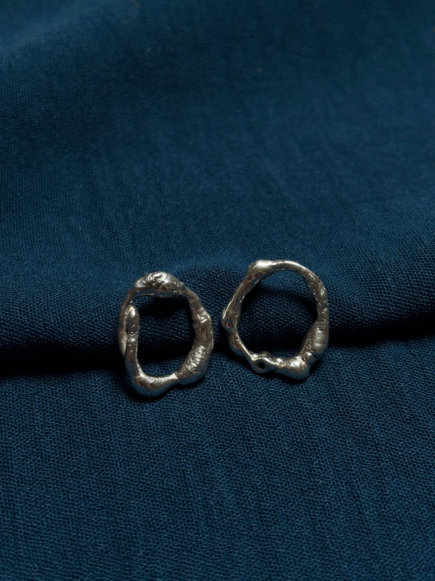 Molten stud earrings