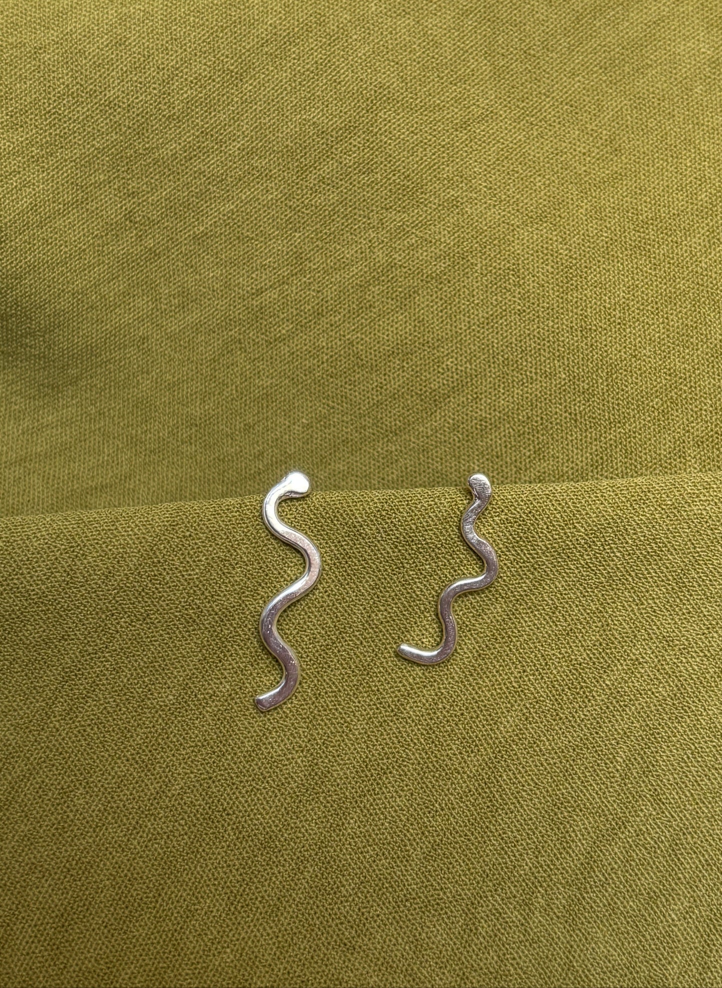 Squiggle ear climber